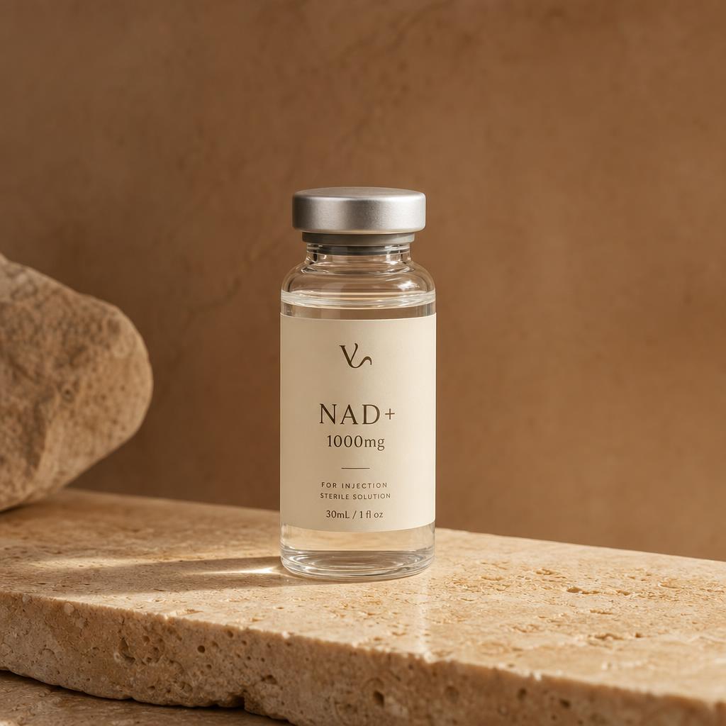 NAD+ 1000mg sterile injection vial on warm travertine